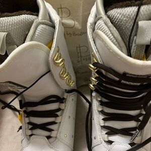 White and Gold ski boots size 6 women's or kids. Bought in Aspen 2 years ago